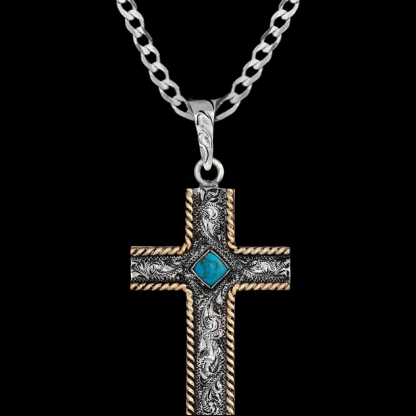 Matthew, Simple yet beautiful German Silver cross with an antique finish, small detailed hand-engraved scrolls, a square simulated turquoise all framed by a jeweler